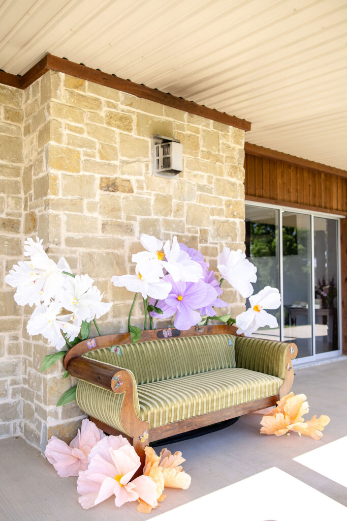 Outdoor ceremony at The Vincent Homestead near Temple, Texas with waterfront views, lush landscaping, and a romantic natural setting.