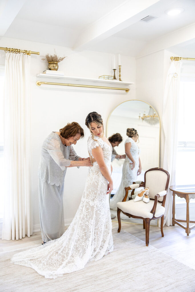 Bride and groom celebrating at The Vincent Homestead wedding venue, a 142-acre estate offering luxury lodging and lakeside wedding experiences.