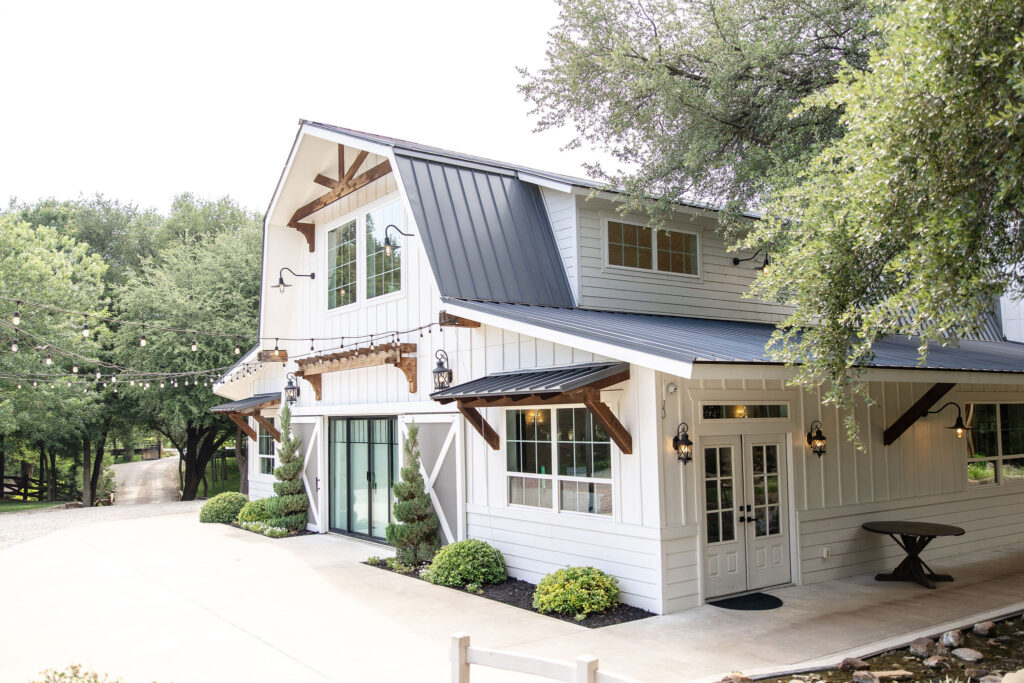 Elegant farmhouse wedding reception at Trickle Creek Ranch in Weatherford, Texas with rustic charm, modern finishes, and spacious event seating.