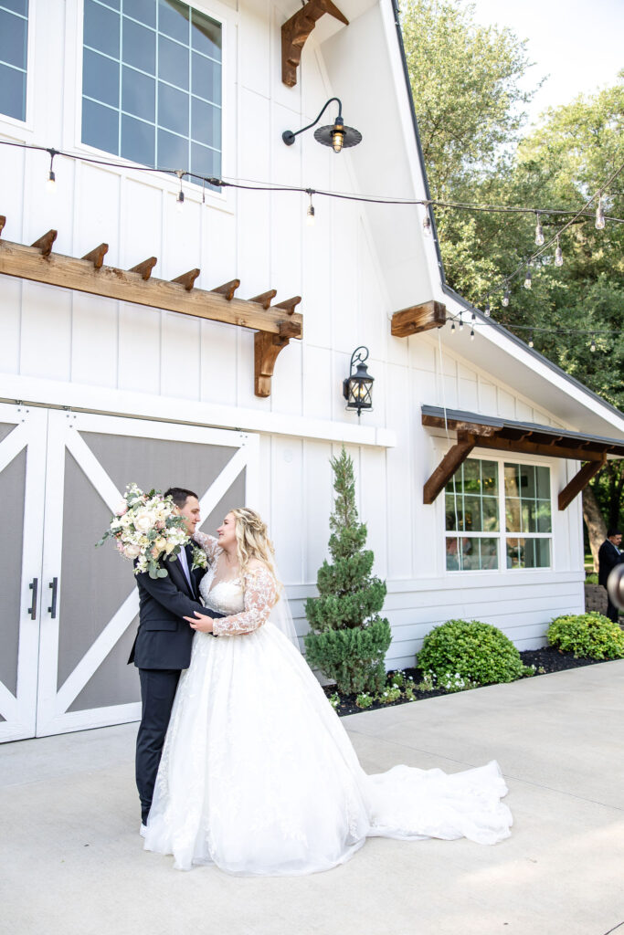 Scenic wedding portraits at Trickle Creek Ranch showcasing the property's spring-fed creek, towering oak trees, and beautiful Texas landscape.