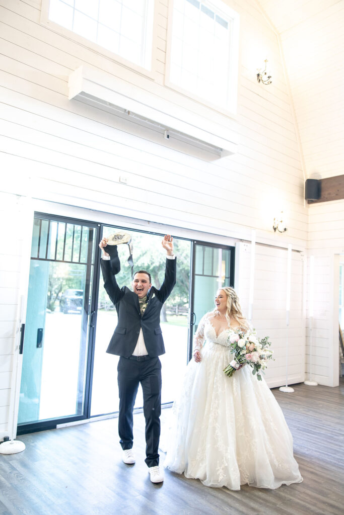 Rustic yet elegant farmhouse-style wedding venue at Trickle Creek Ranch near Fort Worth offering indoor and outdoor ceremony and reception spaces.